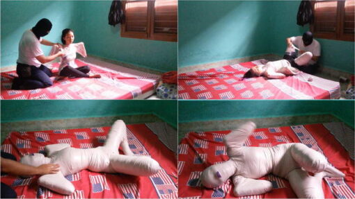 [RM014] In frogtied pose, this girl struggles to free