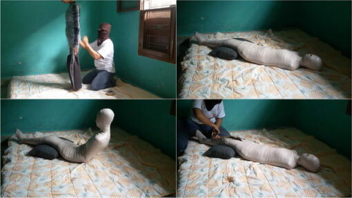 [RM017] A girl in a training costume wrapped up in a mummy in the bedroom