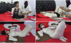 [RM041] A young step-mother mummified in a frogtied pose
