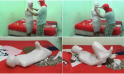 [RM061] A cute girl is mummified in a Hogtied pose in the bedroom