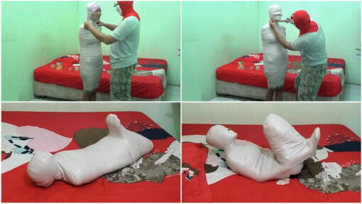 [RM061] A cute girl is mummified in a Hogtied pose in the bedroom