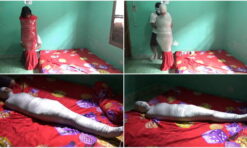 [RM063] A girl is wrapped in a red blanket and reinforced with duct tape