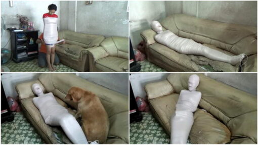 [RM066] A Filipino Chinese girl wrapped in a mummy accompanied by her boyfriend and pet