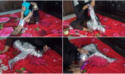 [RM132] A girl is wrapped tightly in a difficult Sitting position with chrome duct tape