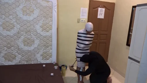 [RM143] A Girl Wrapped Into A Mummy Only Breathes From A Small Pipe And Given Vibrator Stimulation - Image 3