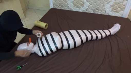 [RM143] A Girl Wrapped Into A Mummy Only Breathes From A Small Pipe And Given Vibrator Stimulation - Image 5