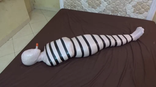 [RM143] A Girl Wrapped Into A Mummy Only Breathes From A Small Pipe And Given Vibrator Stimulation - Image 6