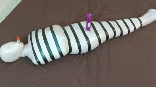 [RM143] A Girl Wrapped Into A Mummy Only Breathes From A Small Pipe And Given Vibrator Stimulation - Image 7