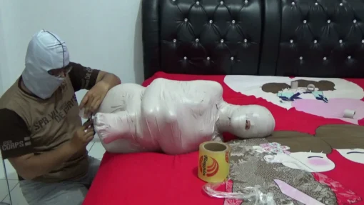 [RM072] This Girl Was Helpless When Put In Car Because Her Body Was Wrapped Tightly In Mummy - Image 4