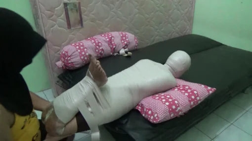 [RM103] The beautiful girl is wrapped in Hogtied and her head is wrapped in a plastic bag - Image 4