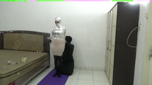[RM118] Beautiful Pakistani girl is wrapped into a mummy with 3 layers of duct tape until her body is stiff - Image 5