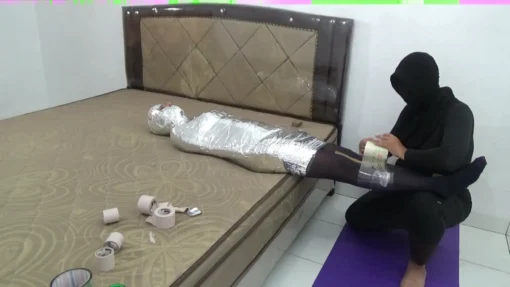[RM118] Beautiful Pakistani girl is wrapped into a mummy with 3 layers of duct tape until her body is stiff - Image 7