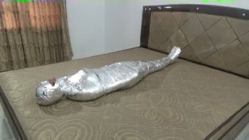 [RM118] Beautiful Pakistani girl is wrapped into a mummy with 3 layers of duct tape until her body is stiff - Image 8