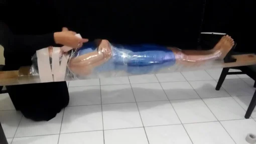 [RM129] Beautiful girl wrapped into wood tightly and face covered in swimcap - Image 3