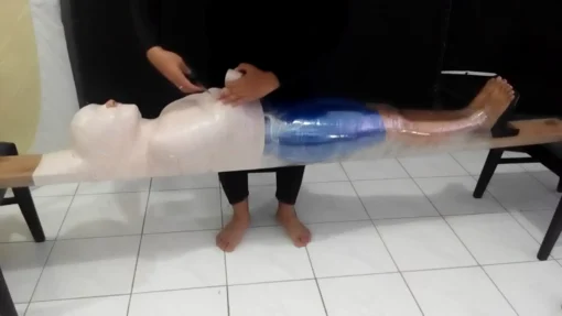 [RM129] Beautiful girl wrapped into wood tightly and face covered in swimcap - Image 4