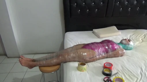 [RM130] Beautiful girl in sexy swimsuit mummified in 2 layers of tape and vibrator stimulated - Image 3