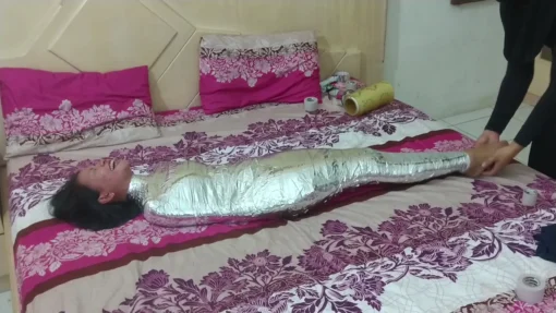 [RM141] This girl is wrapped in 2 layars duct tape and her legs are tickled - Image 6