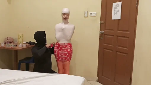 [RM147] A Girl was wrapped tightly and wearing a gas mask that suffocated her breath - Image 2