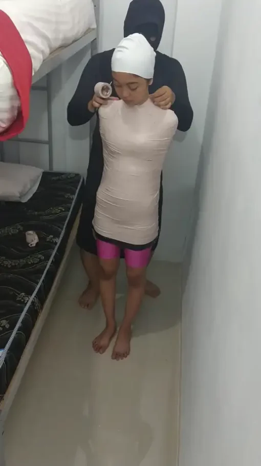 [RM158] A Beautiful Girl Was Mummified With White Duct Tape Then Wrapped Tightly To A Bed Post - Image 3