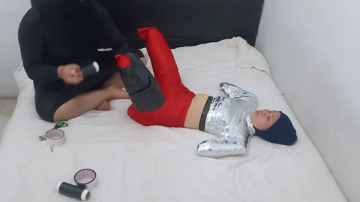 [RM161] This Girl Is Wrapped Tightly In Frogtied Position Like A Helpless Pet Wrapped In Duct Tape - Image 3