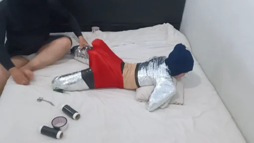 [RM161] This Girl Is Wrapped Tightly In Frogtied Position Like A Helpless Pet Wrapped In Duct Tape - Image 4