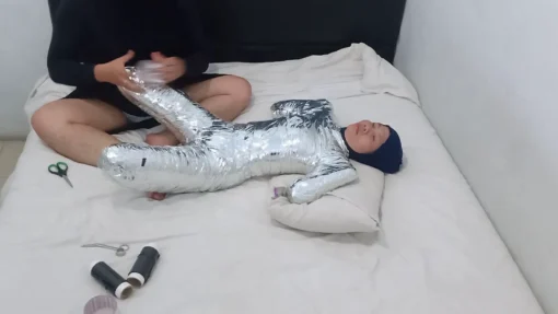 [RM161] This Girl Is Wrapped Tightly In Frogtied Position Like A Helpless Pet Wrapped In Duct Tape - Image 6