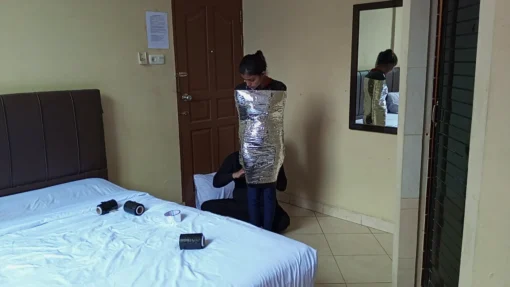 [RM165] A Girl of Pakistani Descent Tries for the First Time to Be Wrapped into a Mummy with Chrome Duct Tape - Image 3