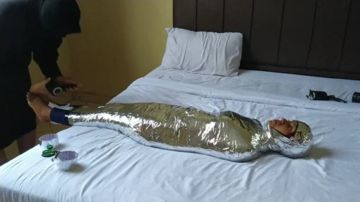 [RM165] A Girl of Pakistani Descent Tries for the First Time to Be Wrapped into a Mummy with Chrome Duct Tape - Image 5