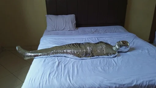 [RM165] A Girl of Pakistani Descent Tries for the First Time to Be Wrapped into a Mummy with Chrome Duct Tape - Image 4