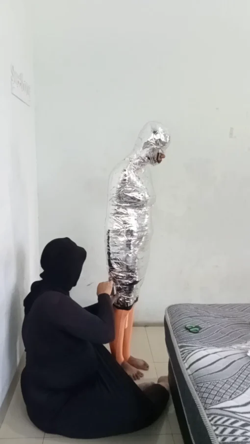 [RM169] Pakistani Girl Wrapped Tightly In Chrome Tape & Breath Restricted Until She Struggles & Crying To Submit - Image 3