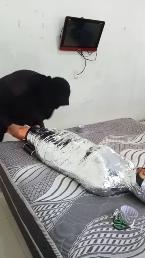 [RM169] Pakistani Girl Wrapped Tightly In Chrome Tape & Breath Restricted Until She Struggles & Crying To Submit - Image 4