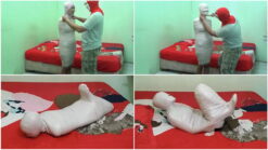 [RM061] A cute girl is mummified in a Hogtied pose in the bedroom