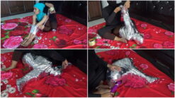 [RM132] A girl is wrapped tightly in a difficult Sitting position with chrome duct tape
