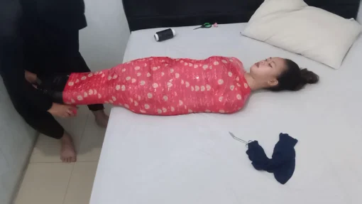 [RM162] A Girl Enjoys Beings Helpless By Being Wrapped In Red Mummy - Image 5
