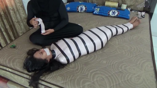 [RM133] Beautiful girl wrapped tight and head covered in swimcap - Image 8